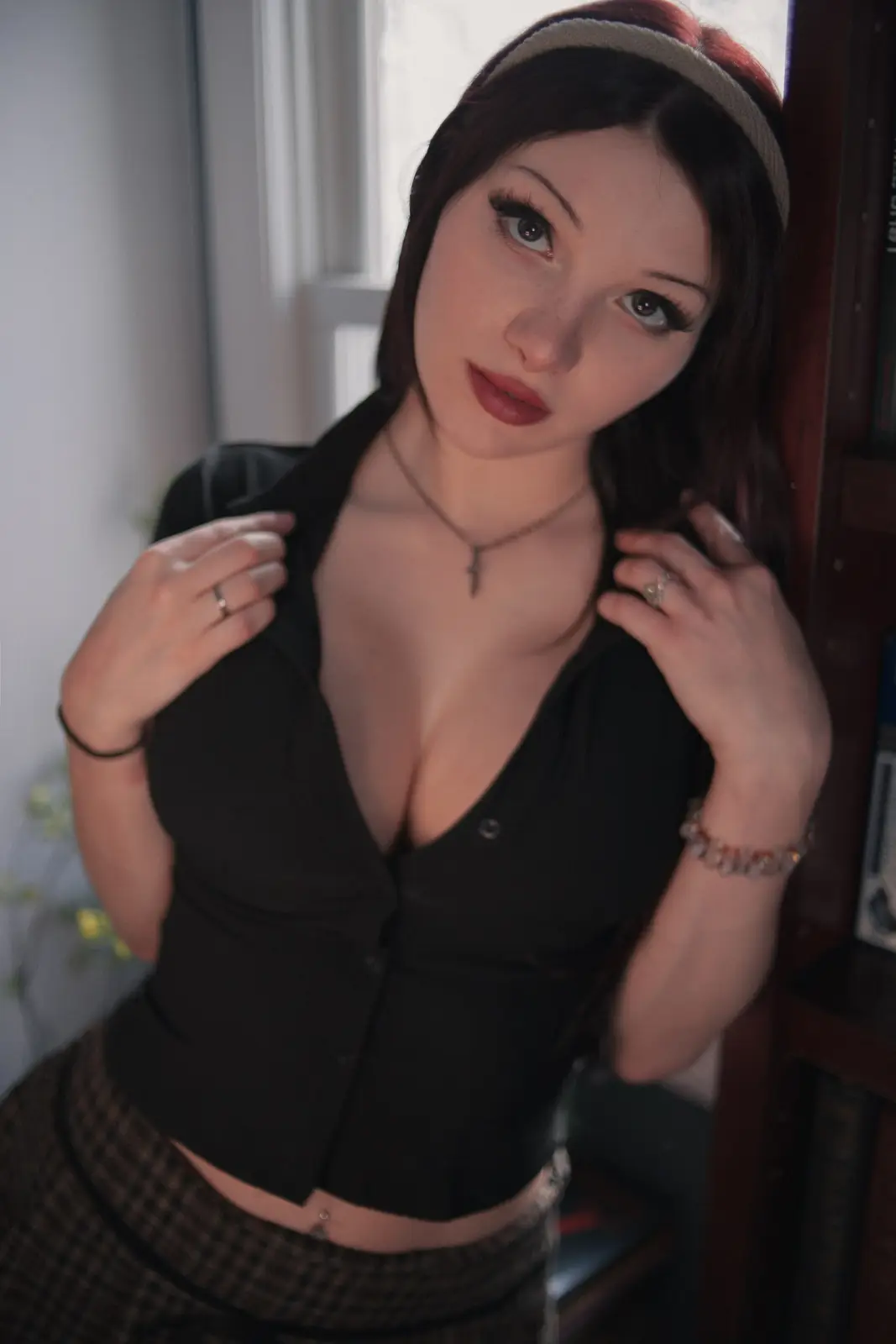 Madikat Teases with Big Tits and Plaid Skirt