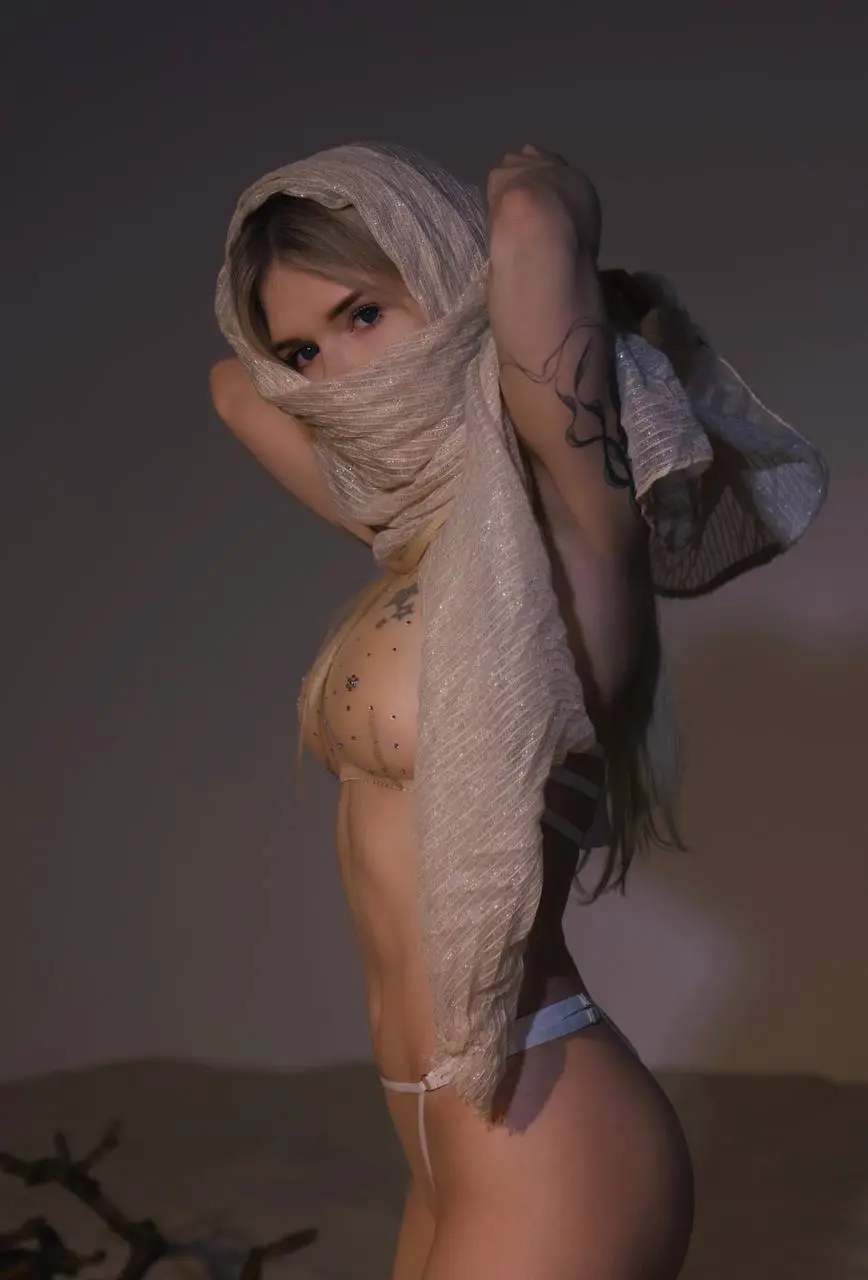 Sorabi's Sheer Fabric Tease with Tattoos